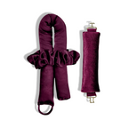 A set of mulberry heatless curlers for side sleepers. and a hair tie, made from Peau De Soie fabric, with gold clasps.