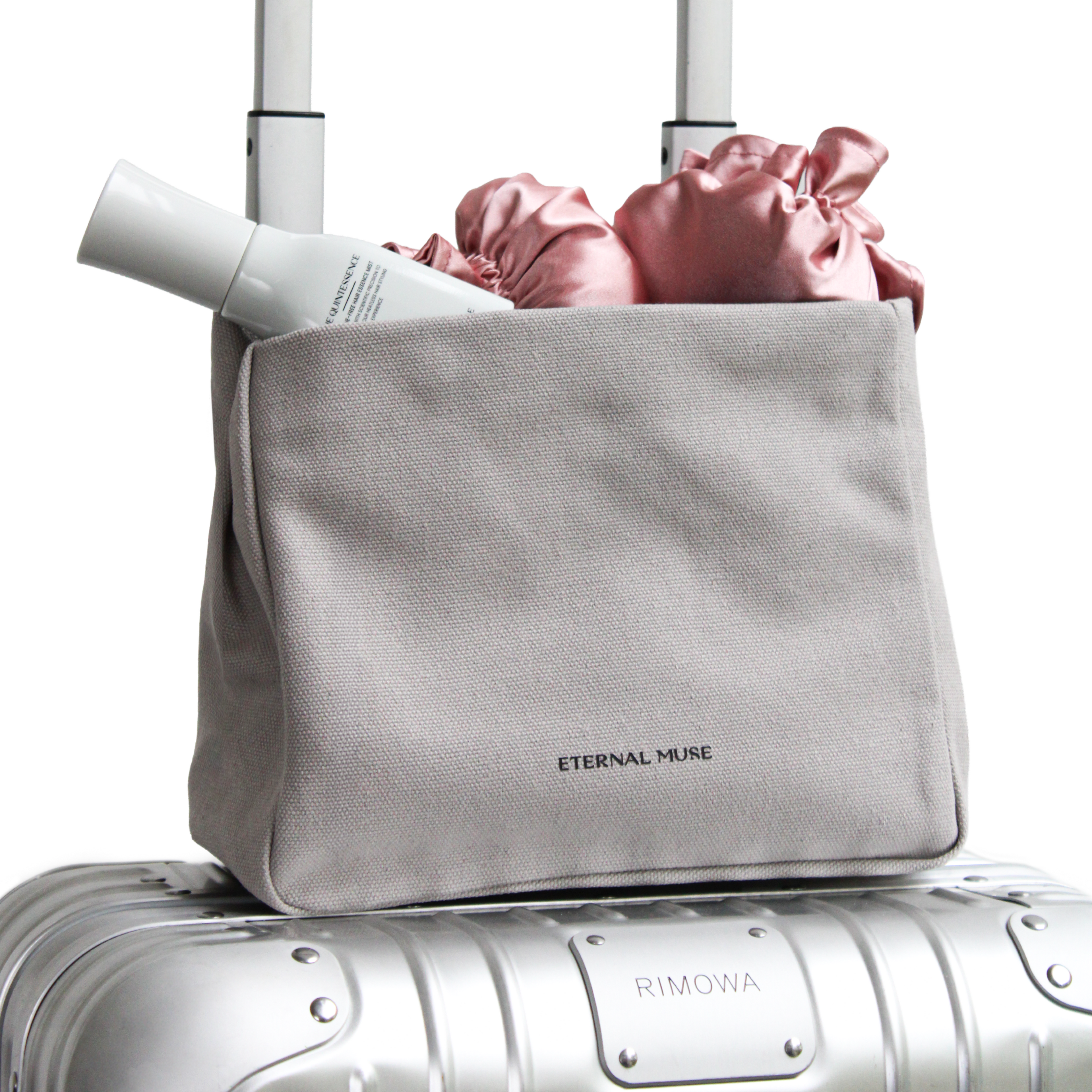 THE E.M. TRAVEL POUCH